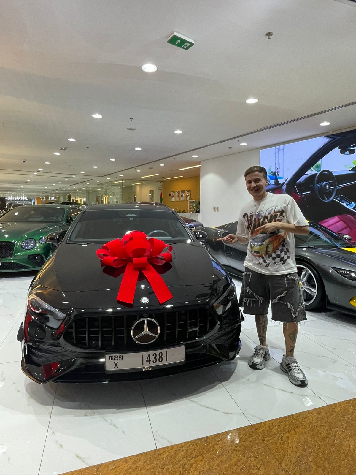 Mercedes-AMG A35 with red bow at the dealership